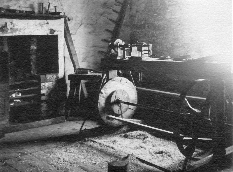 Anvil House -c.jpg - Anvil House -  Appears to be a foot driven lathe. ( Does anyone know any details of this ?)